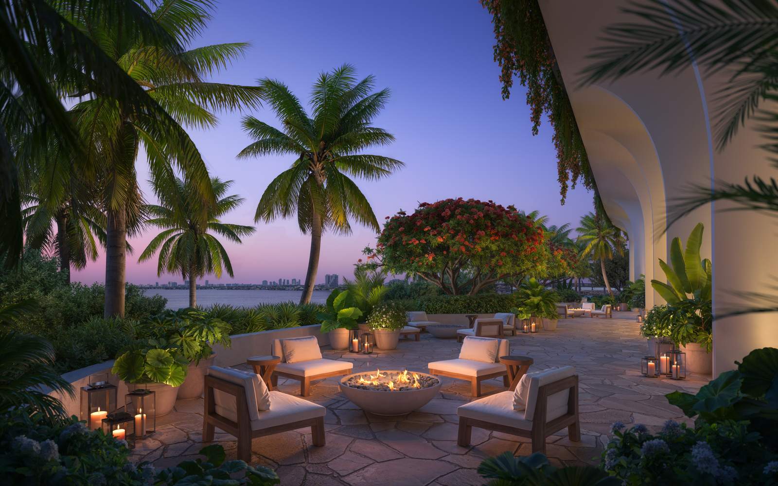 EDITION Residences Miami Edgewater, garden terrace with fire pit at dusk, developer rendering
